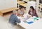 Conducting market research as a team. Shot of a team of colleagues having a meeting in a modern office.