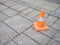 Cone on paving stones. Do not park cars. There is no travel. Attention drivers