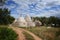 Cone-shaped trulli houses and olive trees in Apulia