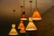 cones shaped vintage retro style electrical ceiling lights at night