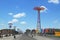 Coney Island Boardwalk, parachute jump tower and restored historical B&B carousel in Brooklyn