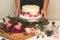Confectioner girl is preparing a cake. The concept of pastry, cooking cakes