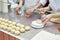 Confectioners bakers cook dough for buns