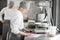 Confectioners working at the bakery manufacturing