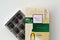 Confectionery box of Warner Hudson finest whisky chocolates flavoured with teachers blended scotch whisky. Beige and green pack of