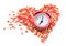 Confectionery sprinkling shape of heart with pink alarm clock