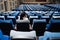 Conference room with many blue and gray seats