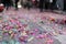 Confetti after a celebration or parade, with a close ground view