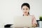 Confidence Business woman in pink portrait with laptop business office