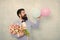 Confidence and charisma. Man bearded gentleman suit bow tie hold air balloons and bouquet. Gentleman making romantic