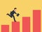 confidence smart businessman jumping on moving up bar graph.Economic prosperity, business profit growth or career path and income