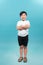 Confident 9 year old boy with arms folded  isolated on a white background