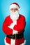 Confident aged male in Santa costume