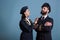 Confident airplane pilot and flight attendant couple portrait