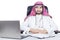 Confident Arabian doctor with laptop on desk