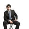 Confident businessman sitting on chair