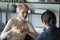 Confident businesswoman talk with client during formal meeting in office