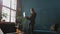 Confident Businesswoman Working on a Laptop in Her Modern blue modern Office interior. Stylish Beautiful Woman Doing