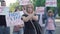 Confident Caucasian woman crossing hands in no gesture on demonstration against sexism and women rights violation