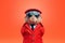 Confident cool hamster dressed as a spy on bright background