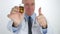 Confident Doctor Thumbs Up and Recommend Pills and Vitamins Cure