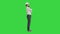 Confident engineer wearing a white helmet standing and changing poses on a Green Screen, Chroma Key.