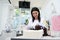 Confident experienced professional dentist, female prosthetic engineer working with a dental mold at dentistry clinic