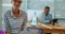 Confident female executive sitting at her desk