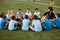 Confident football trainer teach, instruct kids boys
