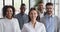 Confident happy diverse business people together in office, corporate portrait