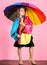 Confident in her fall garments. Waterproof accessories manufacture. Kid girl happy hold colorful umbrella wear