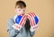 Confident in his strength. Start boxing career. Boy sportsman wear boxing gloves with usa flag. American boxer concept