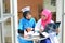 Confident Muslim doctor and nurse busy conversation at hospital