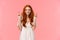 Confident, optimistic and hopeful cute redhead female in white dress, cross fingers good luck and smiling, making wish