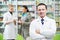 Confident pharmacy chemist man in drugstore