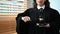 Confident senior judge in robe gown uniform holding a gavel in hands. Lawyer, justice and law and attorney concept