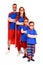 confident super family in costumes standing with crossed arms and looking at camera
