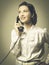 Confident vintage secretary on the phone