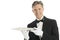 Confident Waiter In Tuxedo Holding Serving Tray