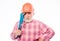 Confident worker. man builder with adjustable pipe wrench. build and construction. professional repairman in helmet with