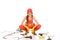 confident workwoman in overalls sitting on floor with different equipment and tools,