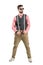 Confident young hipster holding suspenders looking away