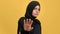 Confident young Saudi woman in black hijab shaking hand no not don't reject gesture posing isolated