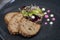 Confit goose rillettes with salad of Frisee, onion marmalade, dijon mayonnaise and toasted bread