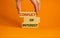 Conflict of interest symbol. Businessman hand. Wooden blocks with words `conflict of interest`. Beautiful orange background. Cop