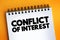Conflict Of Interest text on notepad, concept background