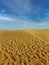 The confrontation of the sky patterns and the hot sand gold, Tenerife, Canary Islands