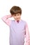 The confuse boy in a pink shirt