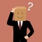 Confused businessman with a cardboard box on his head