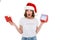 Confused displeased caucasian lady wearing christmas hat holding empty gift